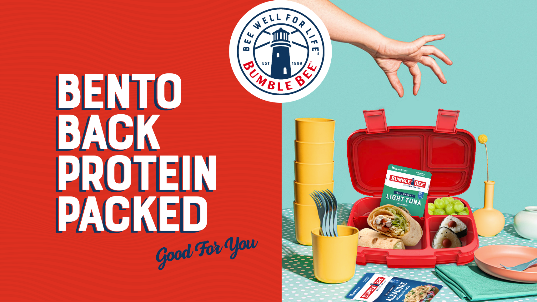 A colorful advertisement showing a lunchbox filled with food, a stack of yellow cups, green grapes, a sandwich, onigiri, and a bottle, with a hand reaching for the lunchbox. The left side has bold text saying 'BENTO BACK PROTEIN PACKED' and a logo fo