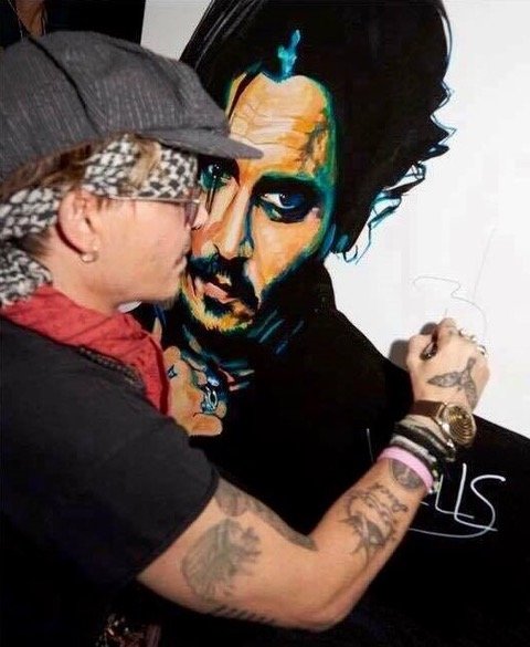 Johnny_Depp_signs_Stacey_Wells_art.jpeg