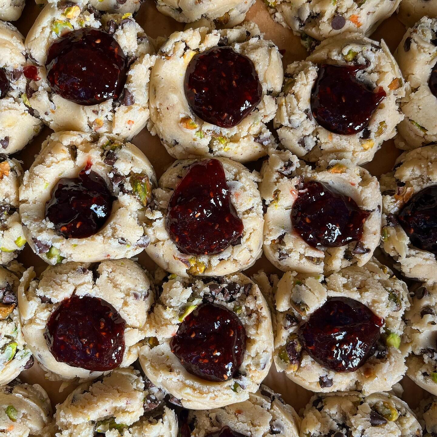 Yum! 🤩 Pistachio, Belgian chocolate, black raspberry shortbreads! Before they go into their luxurious sauna experience (&hellip;oven) &mdash; These and more tomorrow at @mezzomarket 11-4P! I will make a menu list before the market begins. Have a gre