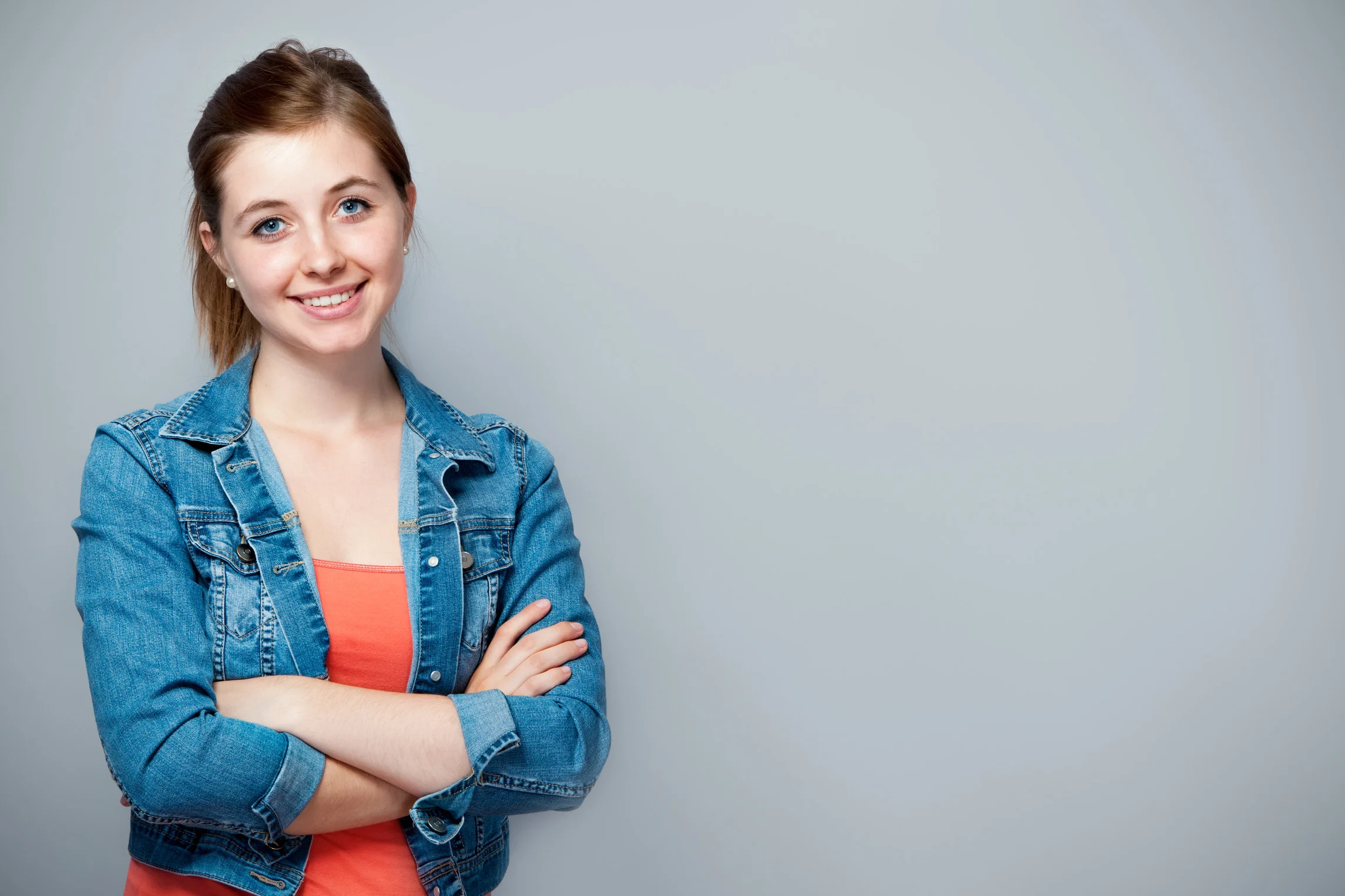 SmilingTeenOnGrey.jpg