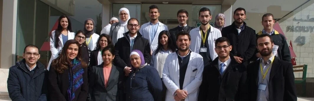 Drs. Abu-Hassan, Dasgputa, and Khadra with medical students from the University of Jordan in Amman after a training on ethical conduct of research in January 2017.