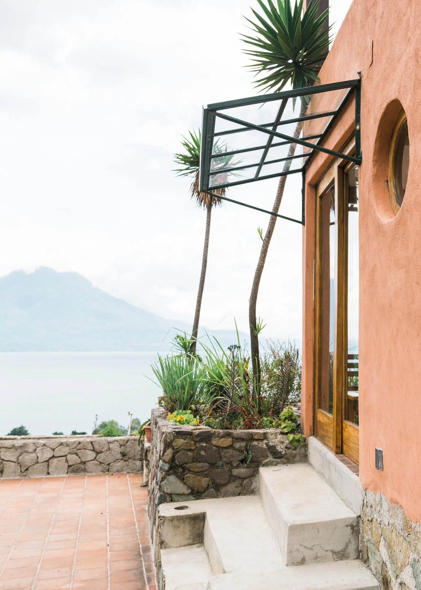 Door to the patio looking over the lake at Adobe Airbnb in Jaibalito at lake atitlan