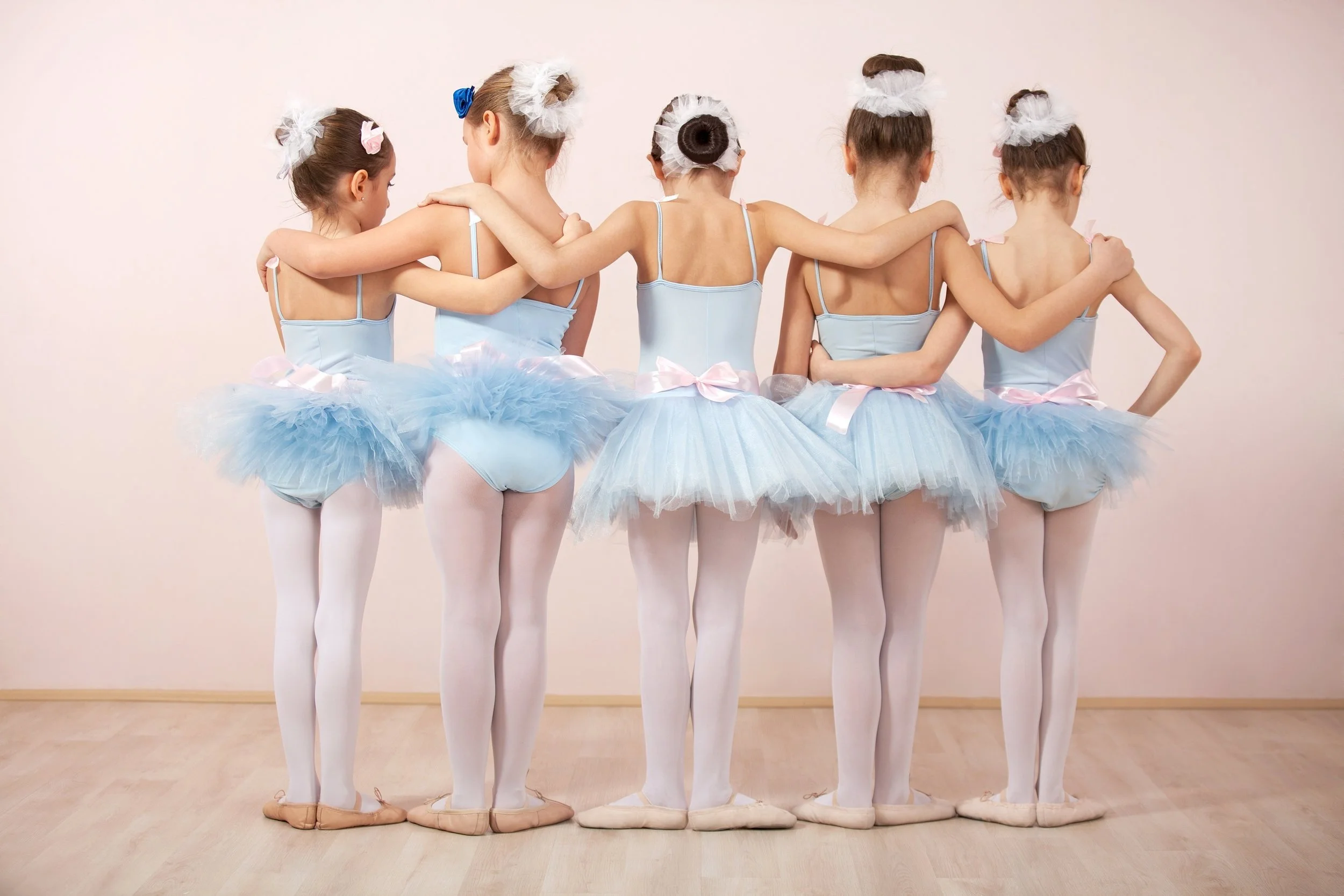 school+age+dancers+from+behind+in+blue+tutus.jpg