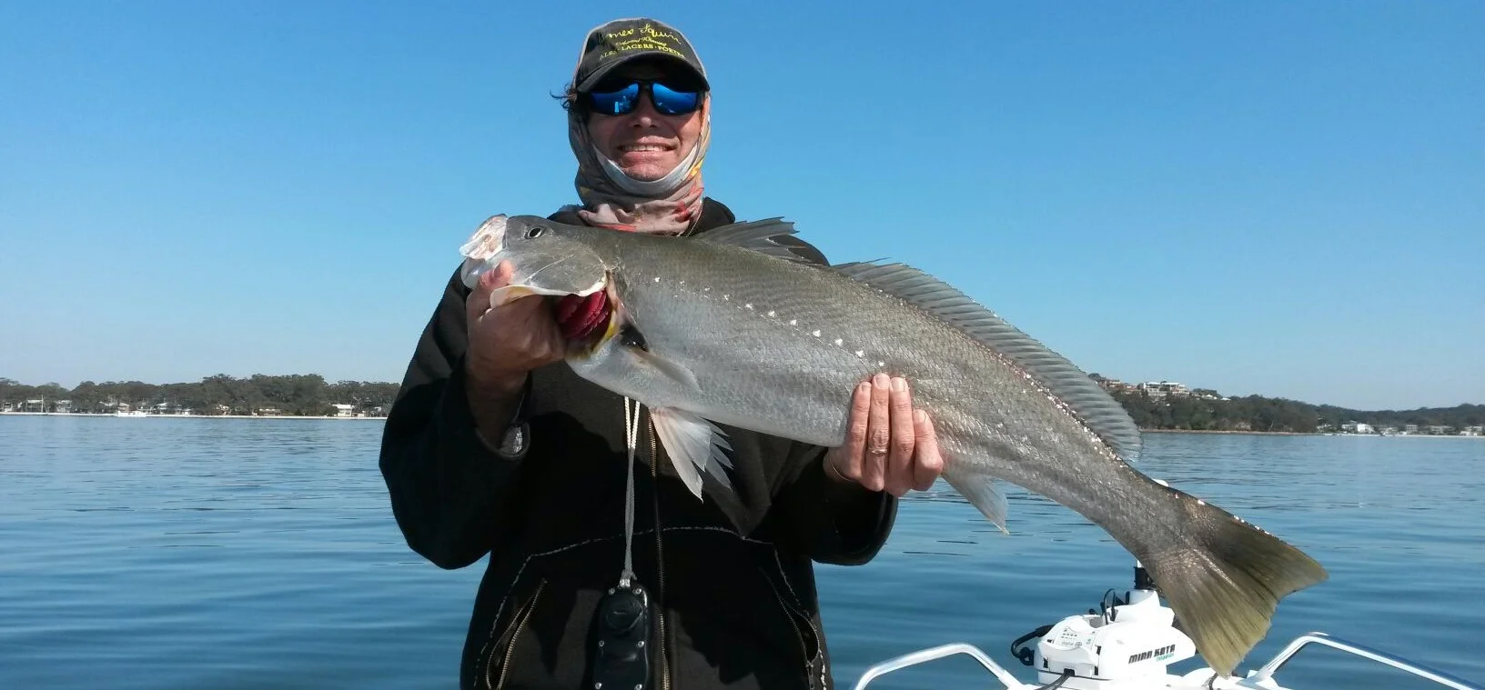 Rod with jewfish cropped.jpeg