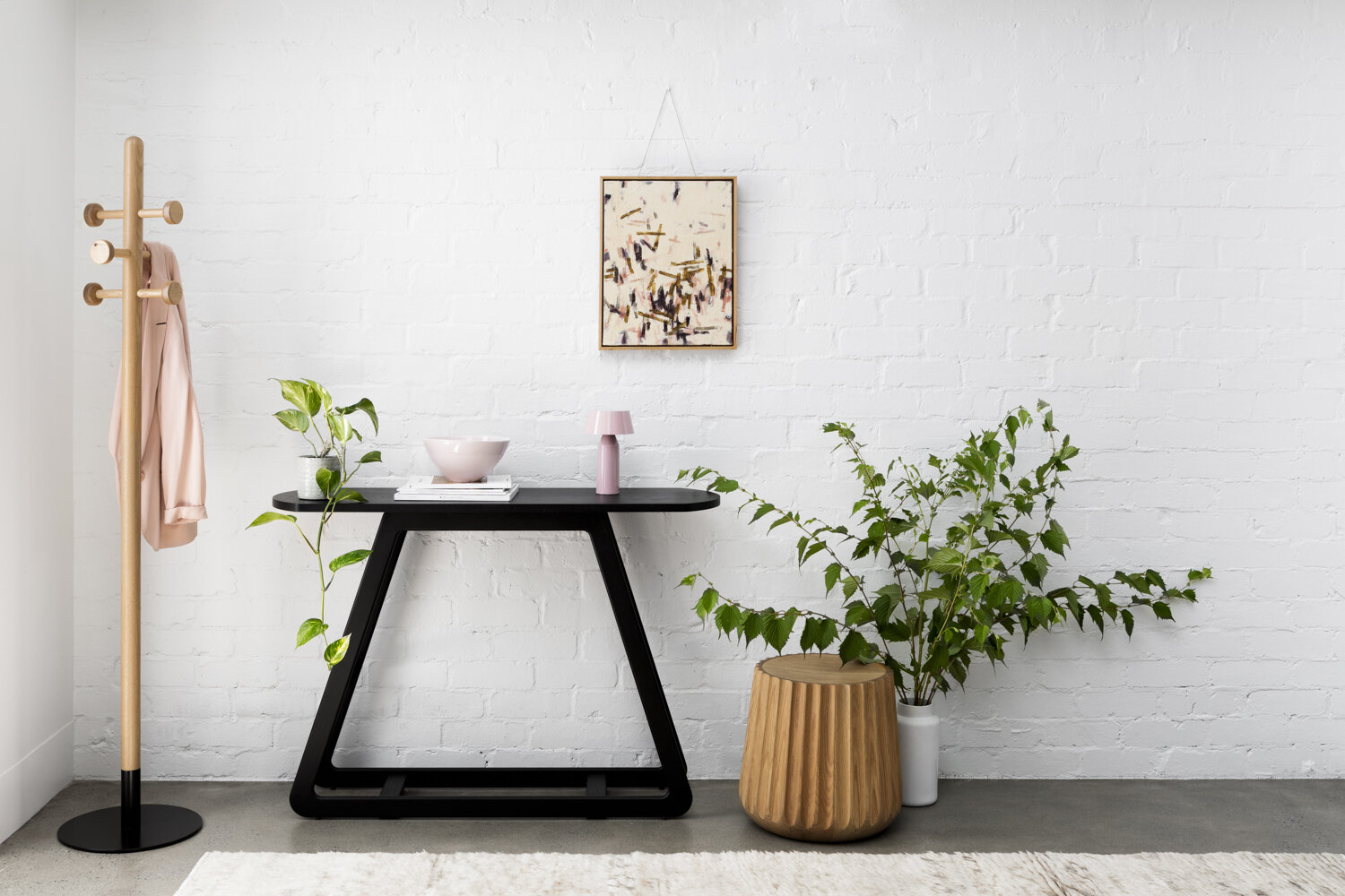 Jules small console in Almost black finish