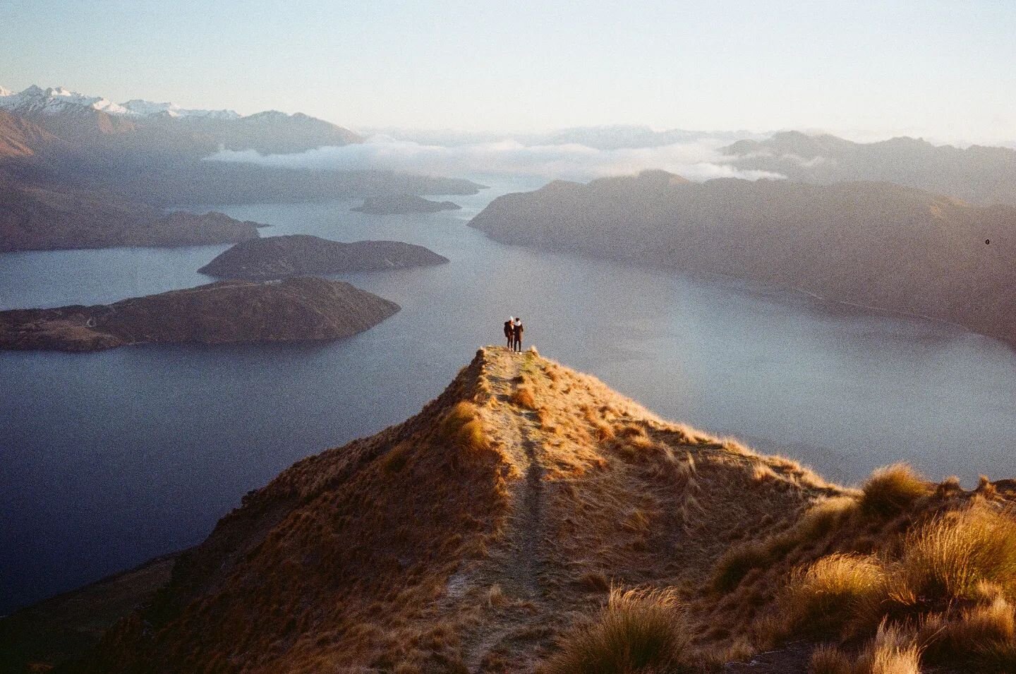 Moments before the surprise elopement. 

Shot on Kodak Gold film with the Olympus AF-1

#coromandelpeak #film #shotonfilm #olympusaf1
@lakewanakanz 
@wanakahelicopters