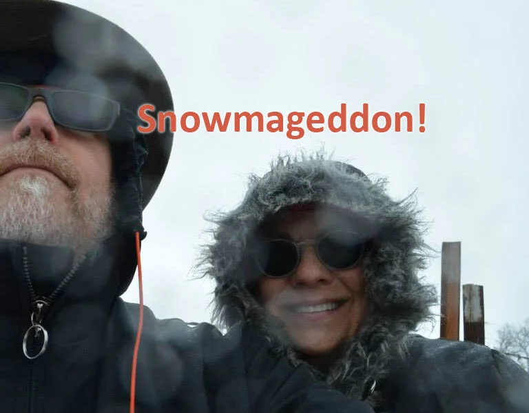 Photo of Mary and her husband, Roger, both bundled in coats with caption, "Snowmageddon!