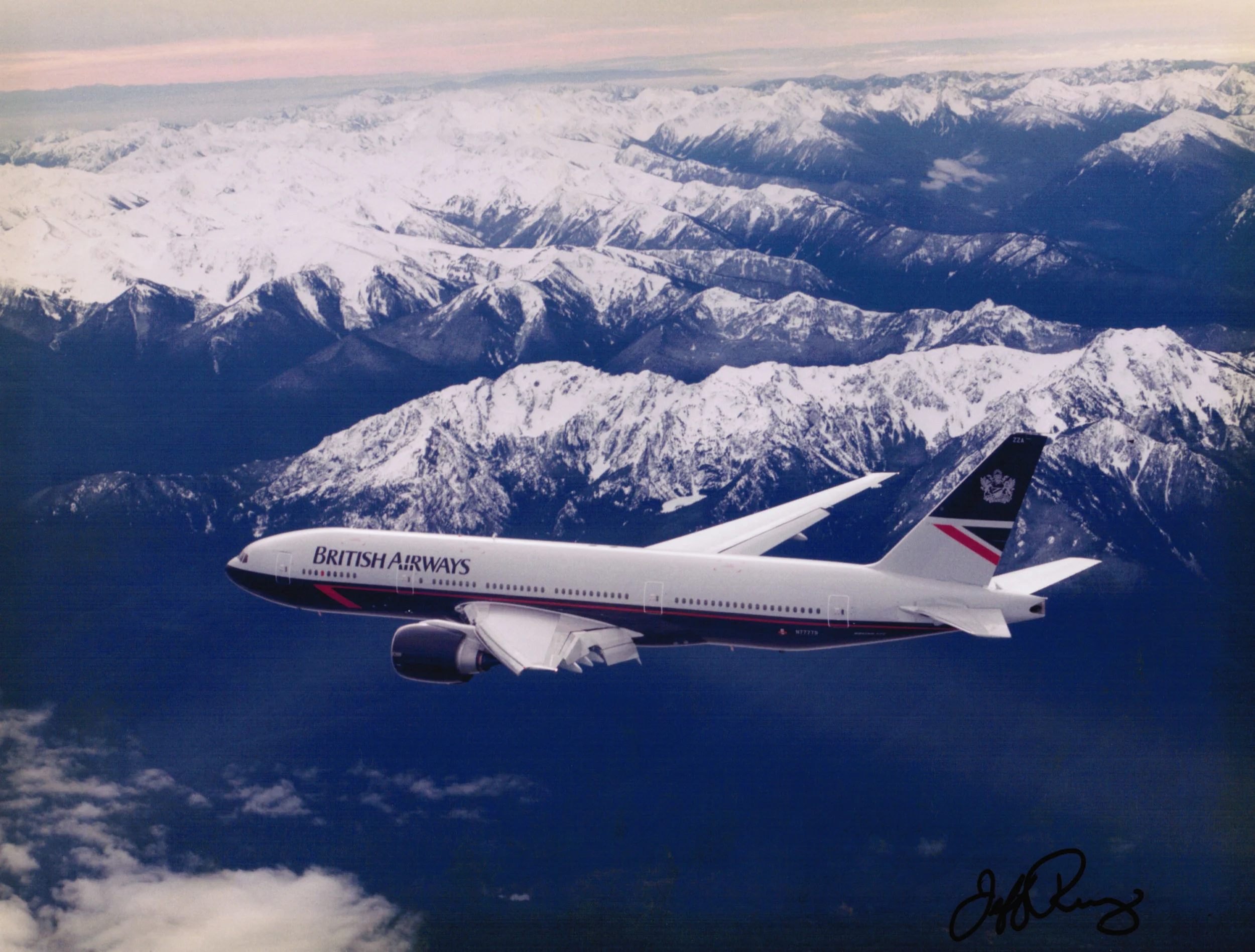 777 Photo courtesy of my friend, Jeff Rumsey, Boeing flight test photographer. He shot from the chase plane high over the Olympic mountains in western Washington state. I love the old British Airways paint scheme.