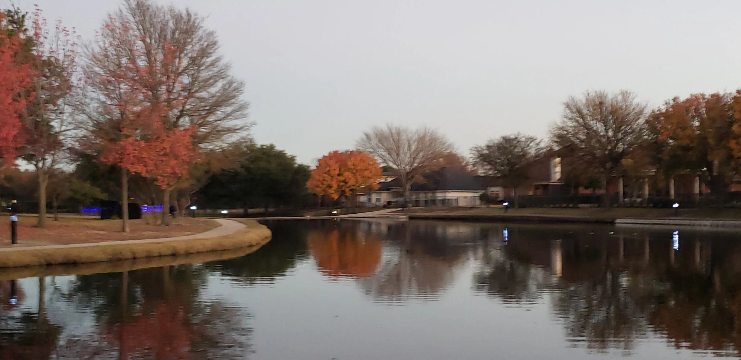 Photo of lake with autumn colors. No text.
