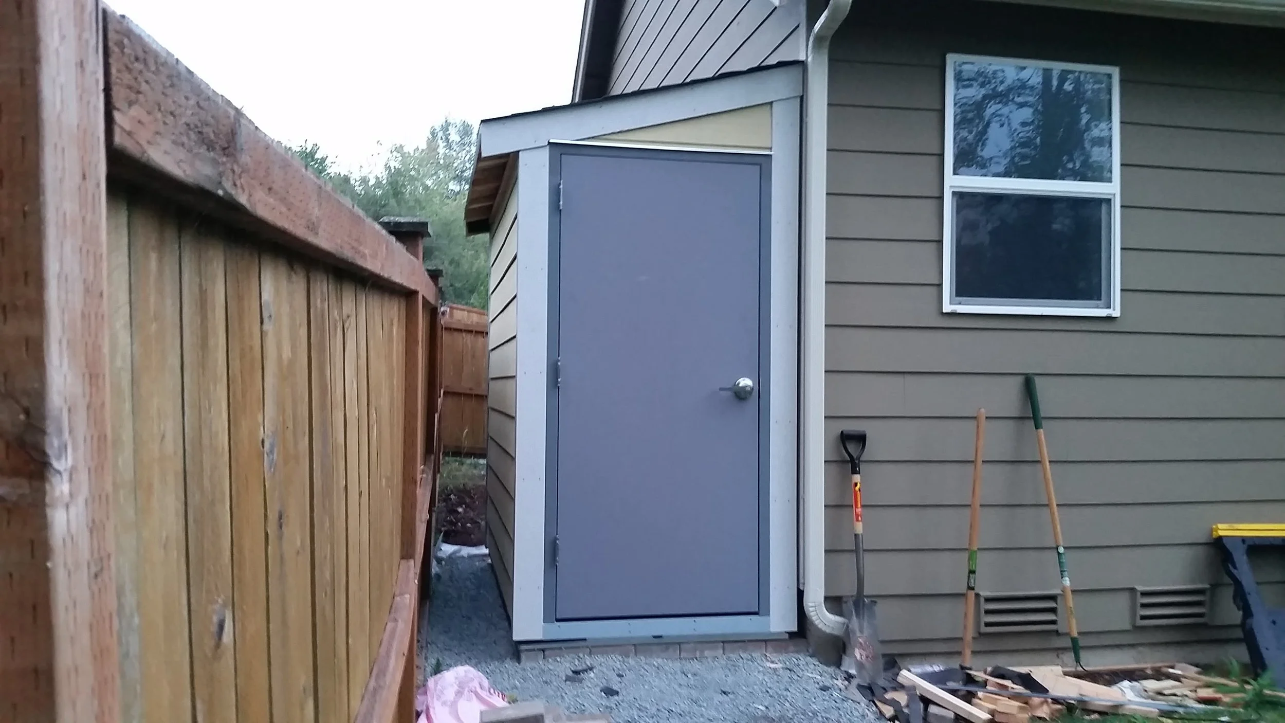 Add a roof, hang the door, install the siding & trim, and slap on some shingles and BOOM, instant shed!