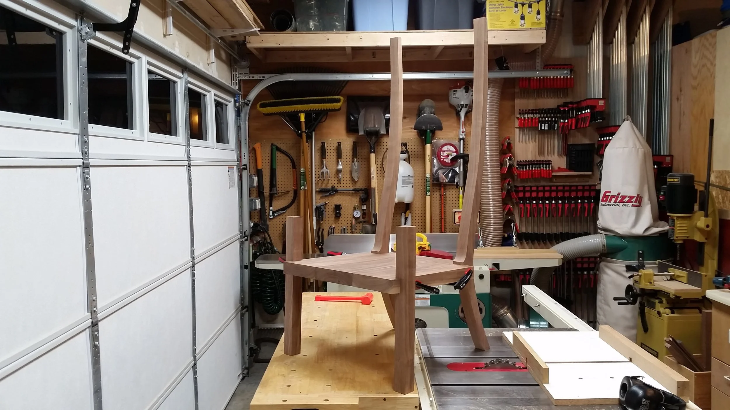 IT'S A CHAIR!!! OK, OK, so it's just some pieces of wood that are dry clamped together in the rough shape of a chair, but I think that still counts!