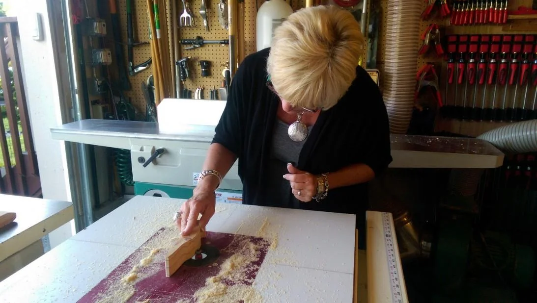 After a quick lesson from Kurt, Cindy took over router table duties and was rounding over the edges like a pro in no time.