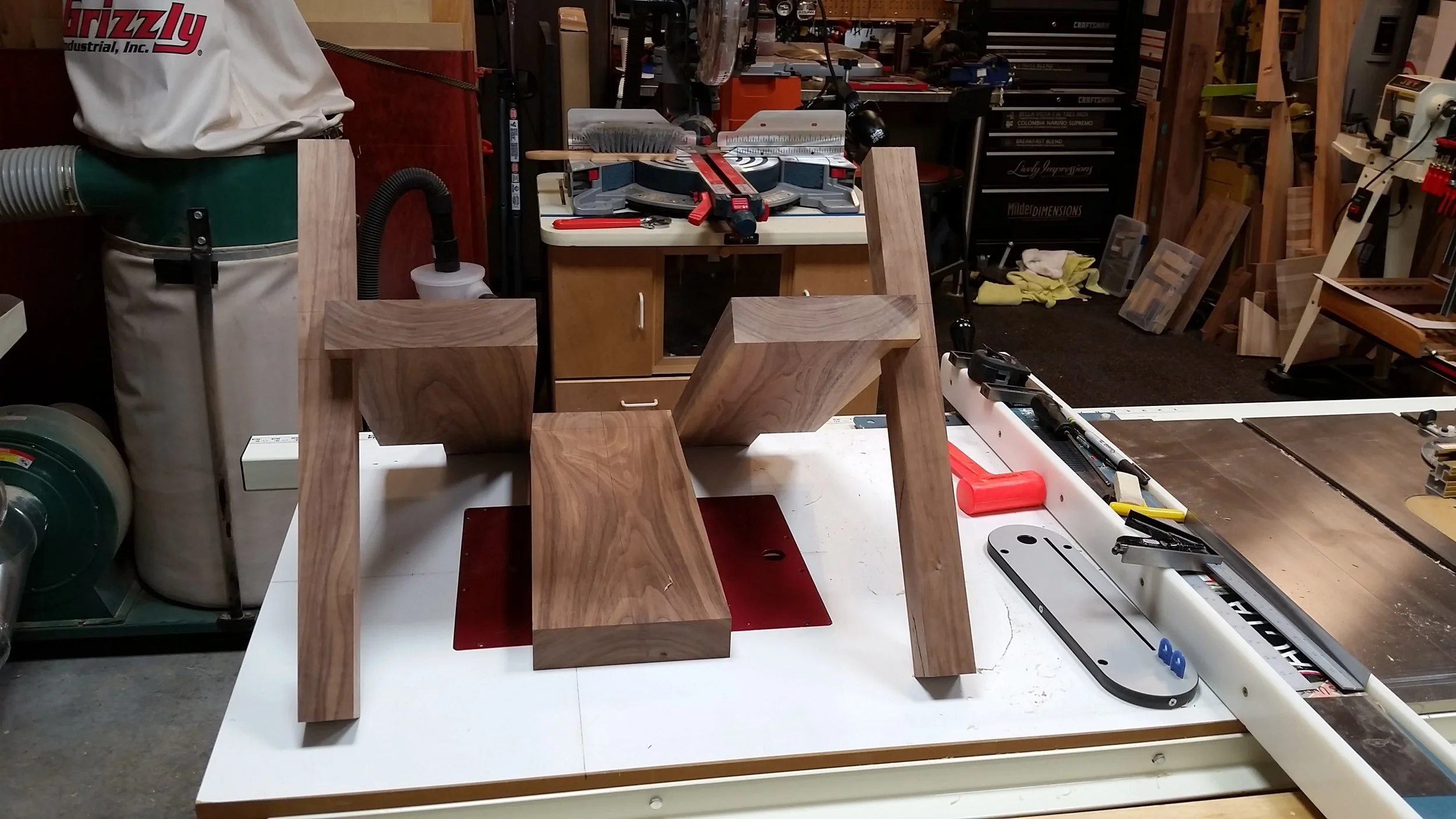 Here's the front legs fitted onto the outside seat boards. It's starting to actually resemble a piece of furniture!