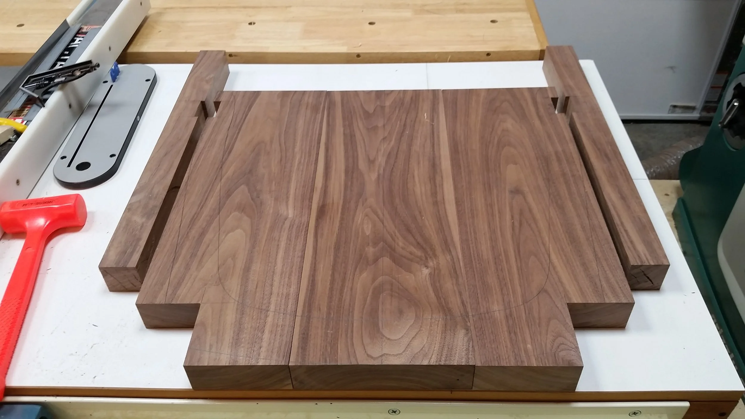 Seat boards and front legs with dados cut.
