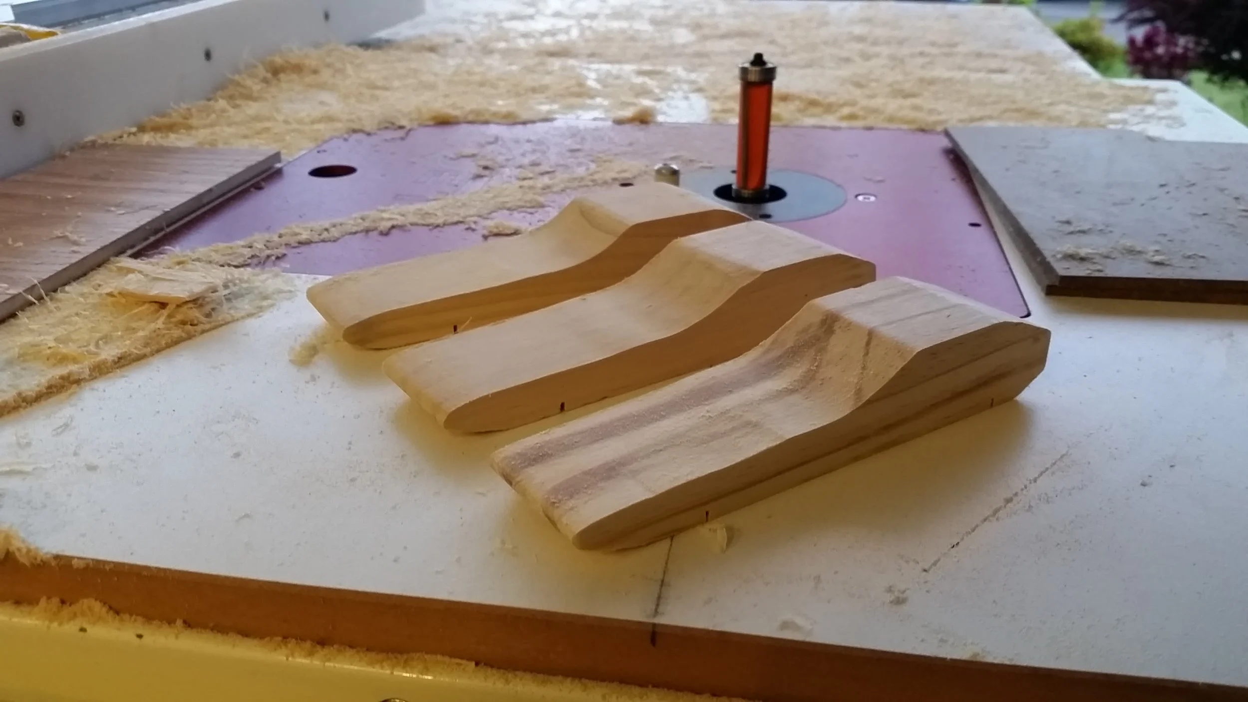 Once I had the templates made, I found that i could trace the shape on the block, cut it out on the bandsaw, and sand it on the spindle sander in just a few minutes.