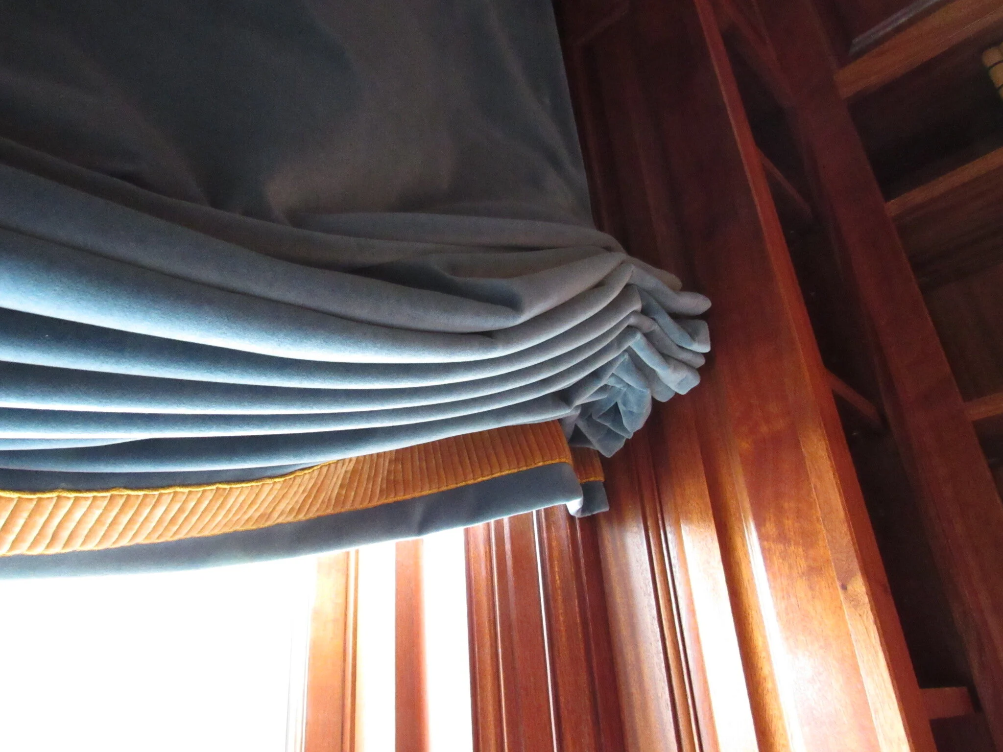 Blue Velvet with Gold Velvet Trim Set the Tone for This Study