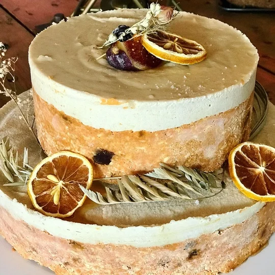 Raw Carrot cake. We can make one tier or two; vibrant, fresh. autumn spices and fruity. £30 - £50 Cashews, variety of dried fruits, Fresh carrot, spices, Date