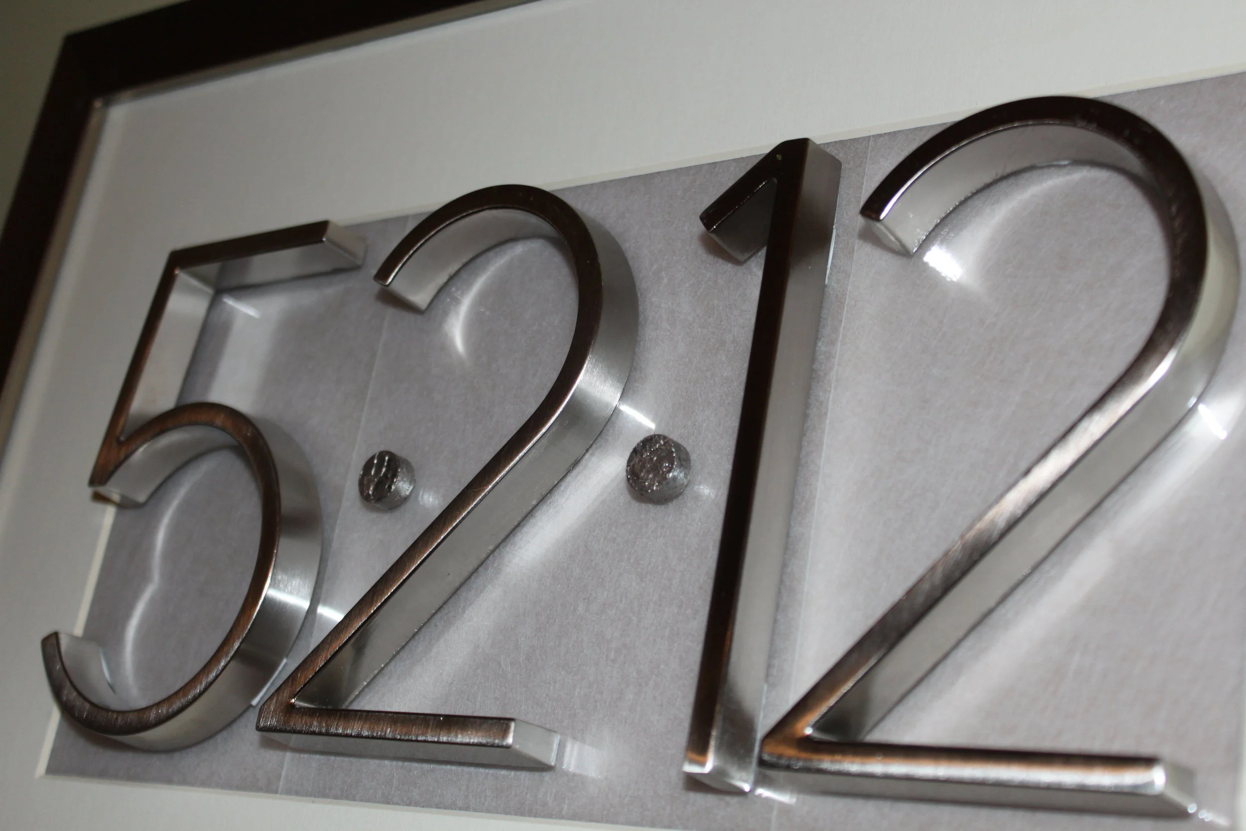 House numbers on a frame