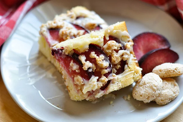 Amaretti Plum Crunch Cake_sliced drizzled HERO-0073.jpg