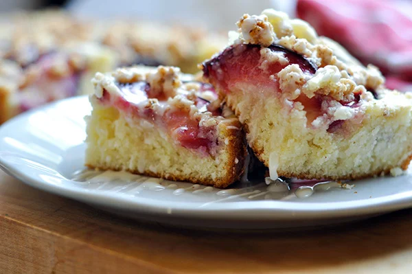 Amaretti Plum Crunch Cake_sliced drizzled side view-0056.jpg