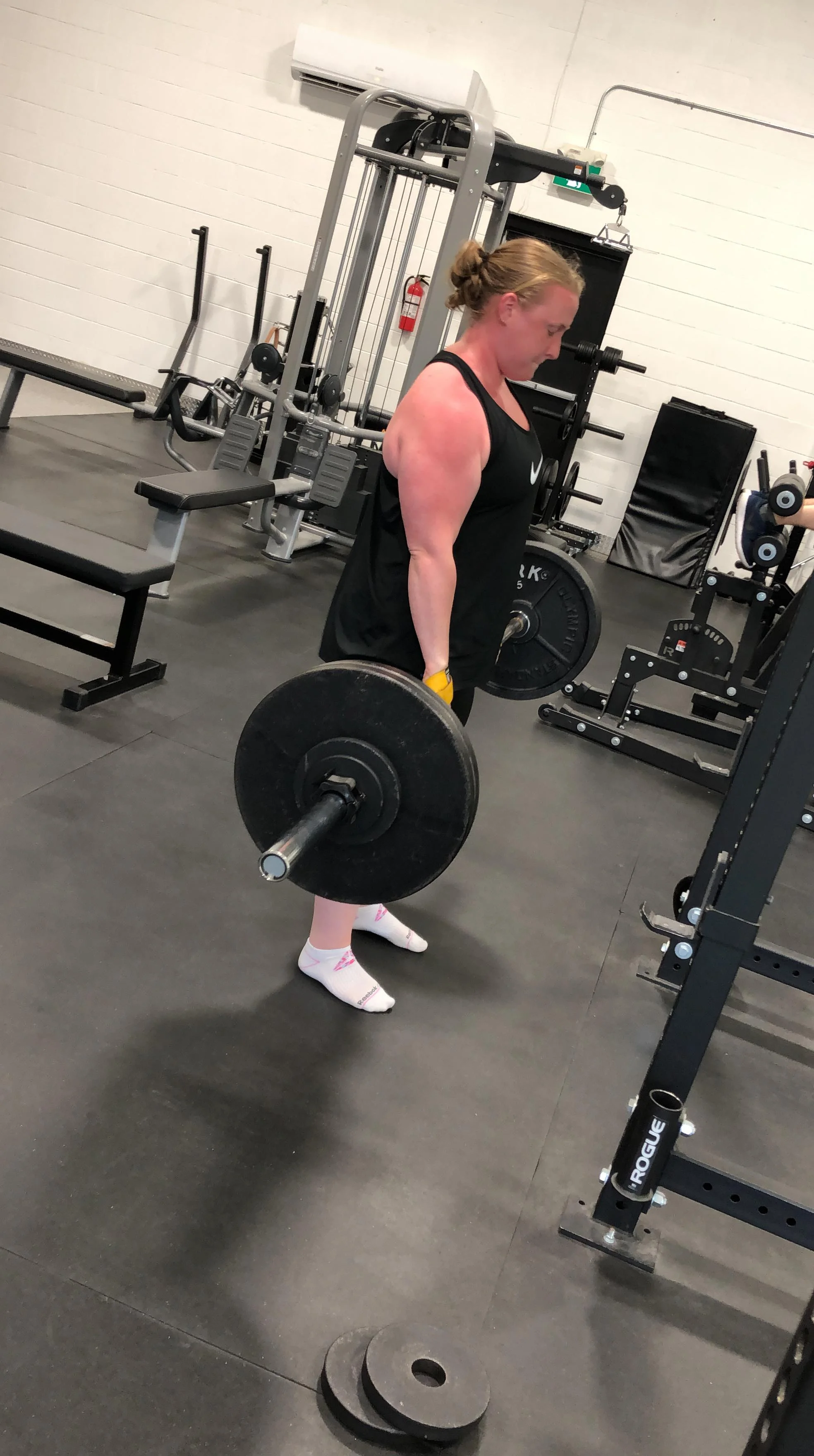 Courtney with a 250 lb deadlift personal best.