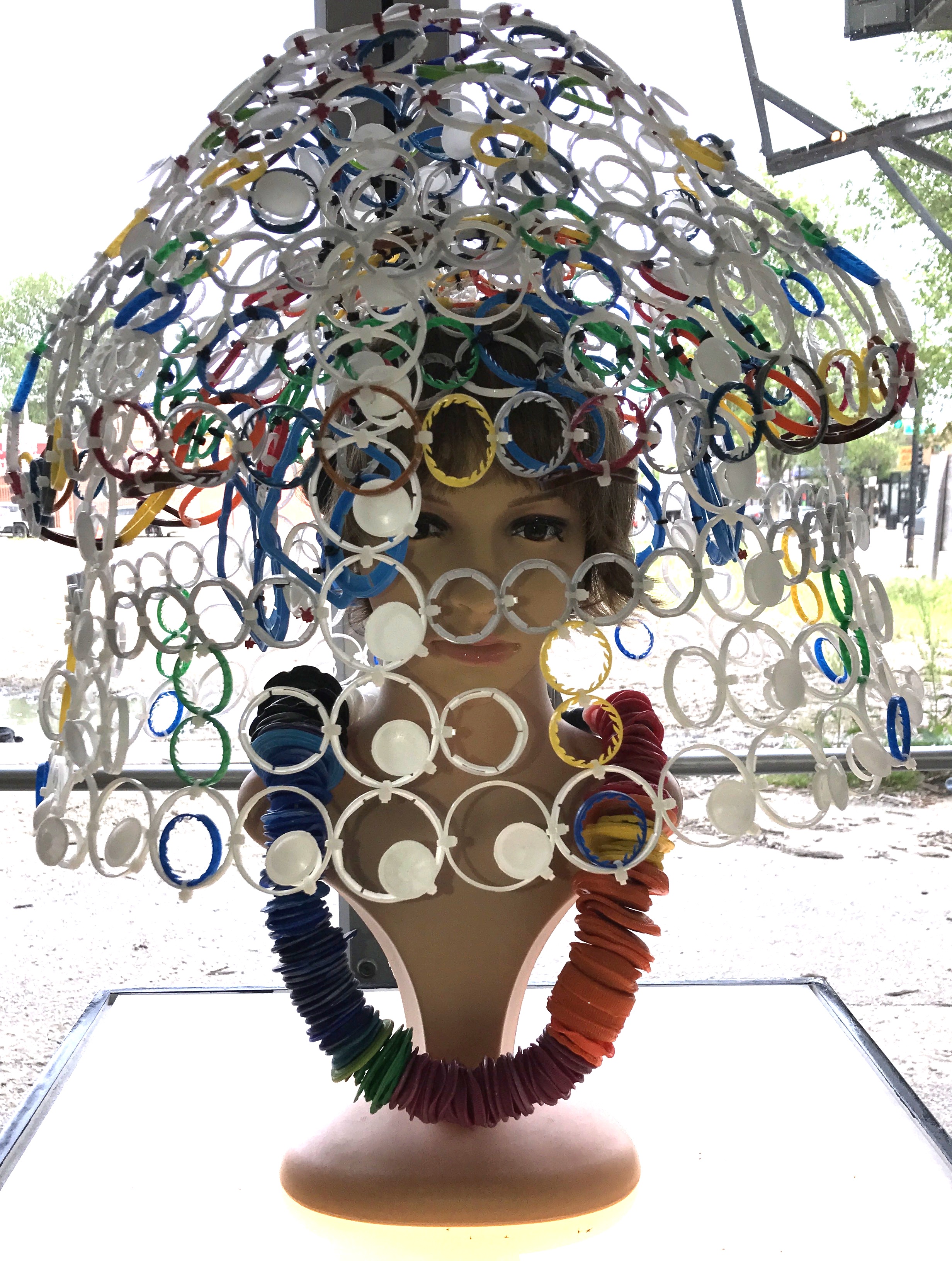 Alan Emerson Hicks, a sculptor and performance artist working in the media of found objects and time. Alan studied sculpture at Illinois State University with a professor from the graduate program of Rutgers University. Alan feels he received an East Coast education in the Midwest. Alan's sculpture projects emphasized concept over material. An Idea that continues in his work today. Alan’s recent work began when jazz conductor, Dan Godston, challenged him to create sculpture during one of his performances. It was Alan’s concept to begin, work on and finish the sculpture during the set. Alan started working with materials, found objects, that reflected a sense of urgency. This experience lead Alan to work primarily with found, reused and discarded materials. Alan would like the viewer to see the plastic objects of their lives re-purposed. Hopefully changing the way, they discard these materials.