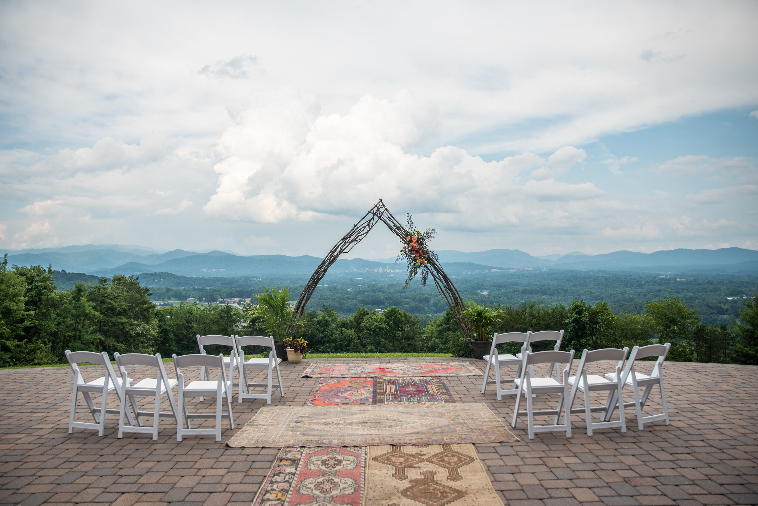 Mountain elopement ceremony set up with chairs 