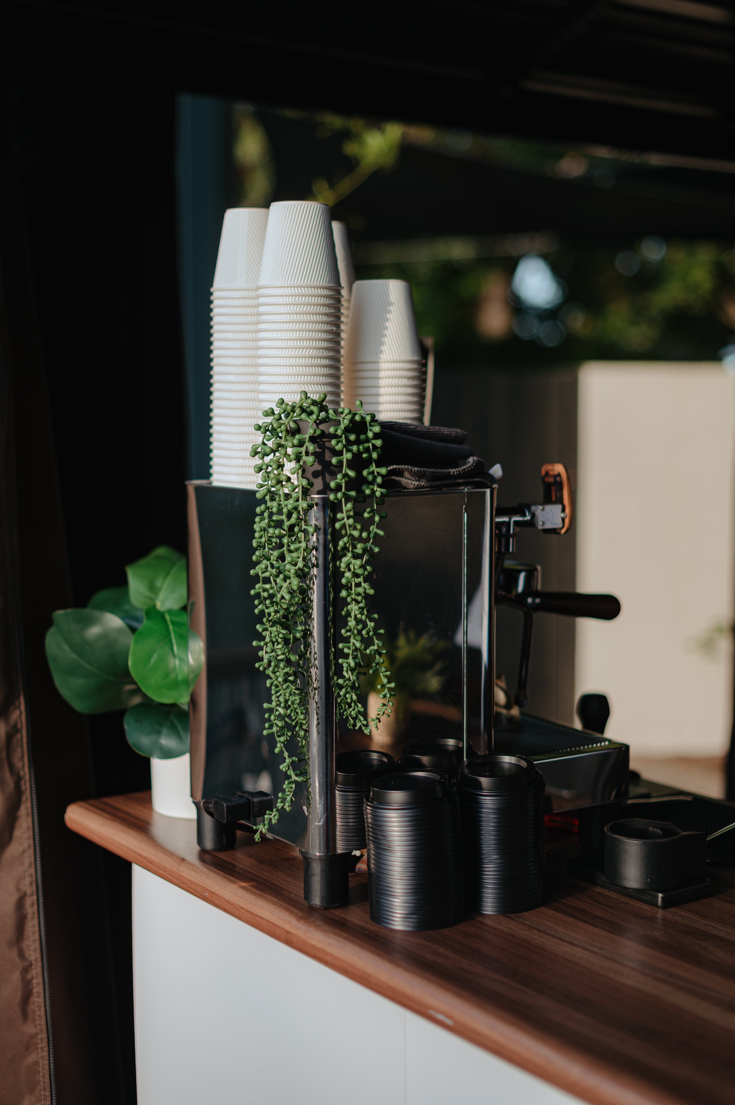 Houston coffee cart catering close-up of an espresso machine at an event.