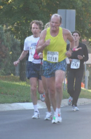 OK, Maybe not a great pic but there is no denying I am racing ahead of Bill Rogers, uphill at mile 9 of The Brooksie Way Half Marathon 2008.