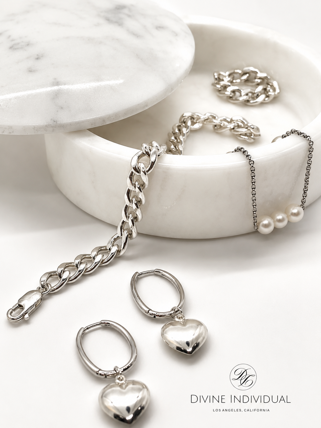 silver jewelry pearls.png