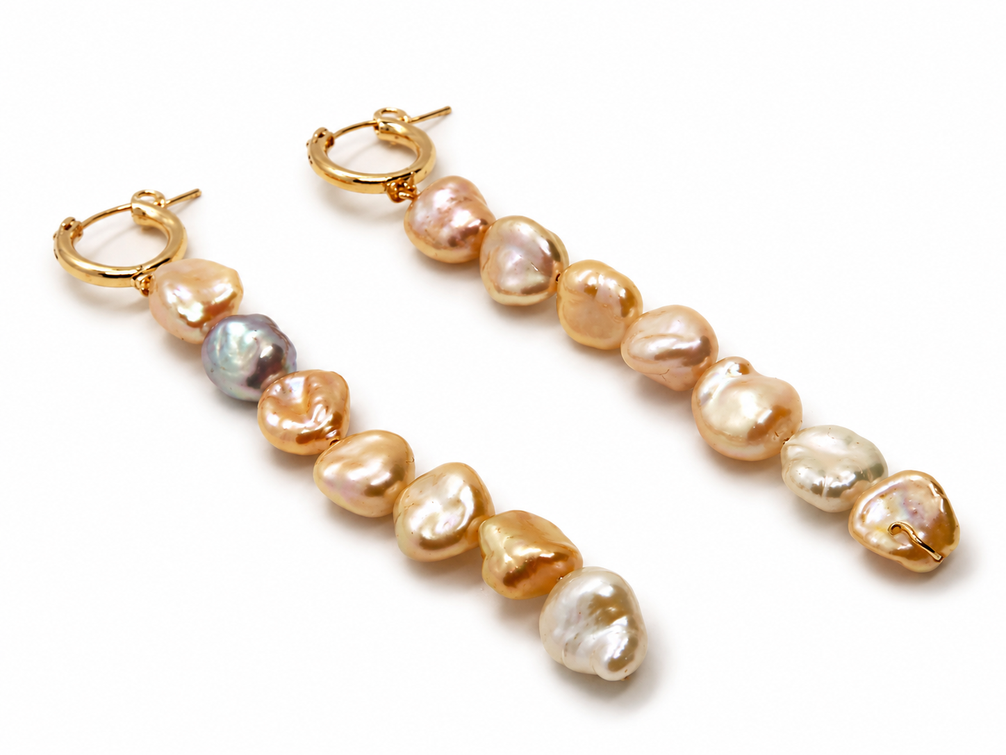 flatlay pearl earrings.png