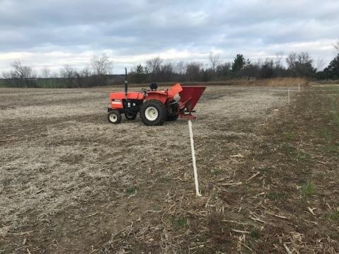 Our Allis-Chalmers 5030 and our fertilizer spreader on the back.
