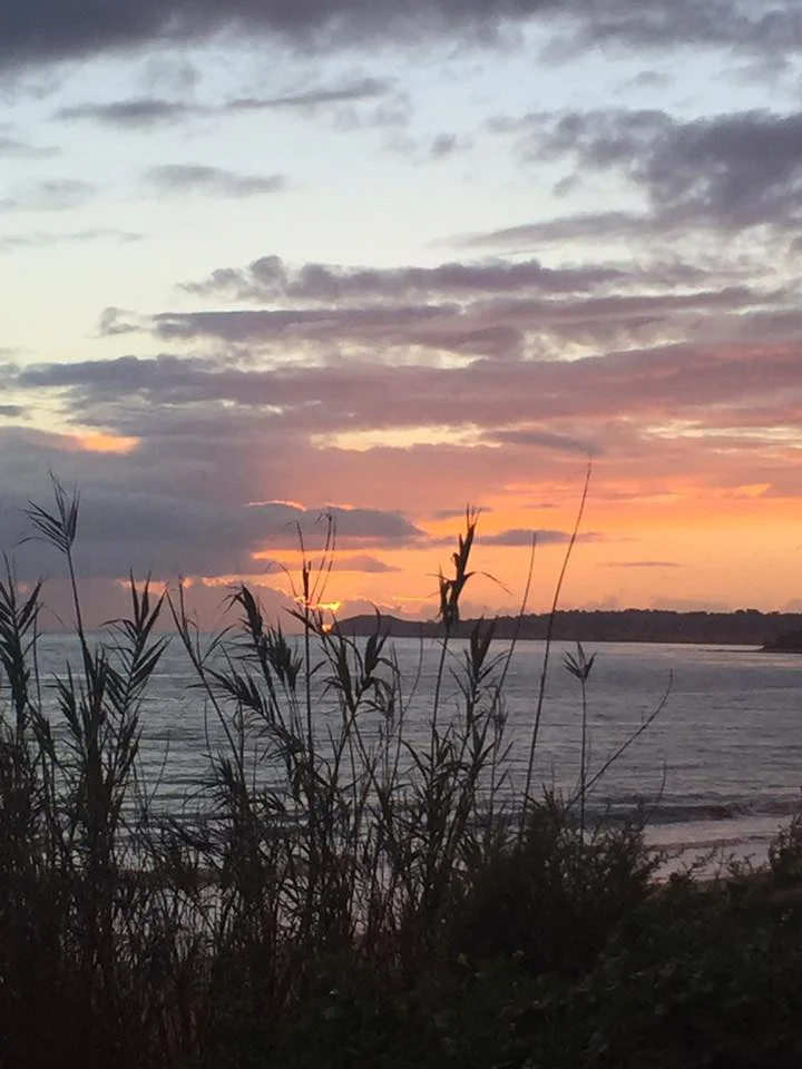A Sunset and a Rainbow Herald the Arrival of the New Year
