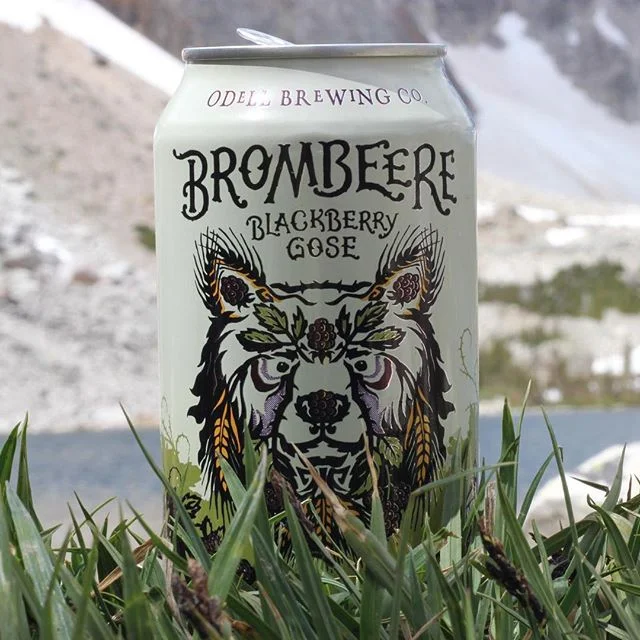 A glowing Brombeere by Odell Brewing Co sits on the shores of Lake Marie in Medicine Bow Routt National Forest #beersandnature // photo courtesy of @the_brogans