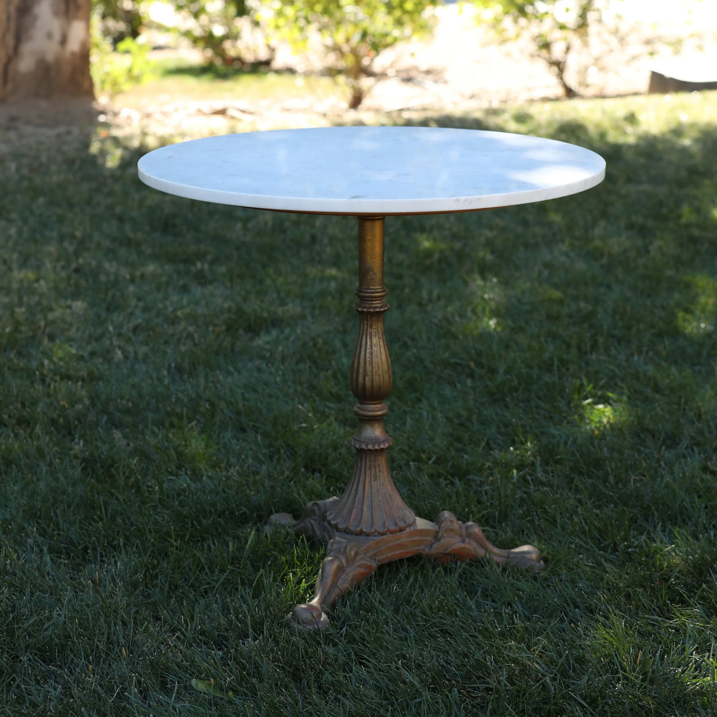 marble top round brass table.JPG