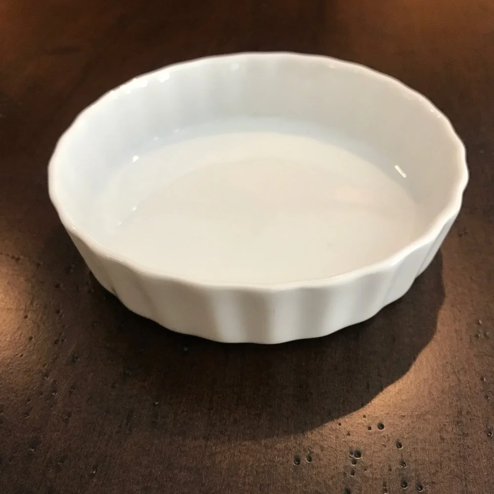White Creme Brûlée 4.75” round x 1.25” tall. Scalloped side ramekin.