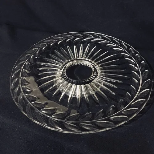 Laurel Pedestal Platter. Cut glass platter with a laurel leaf edge and a sunburst in the middle. Short and squatty. 13.5" round x 1.5" tall