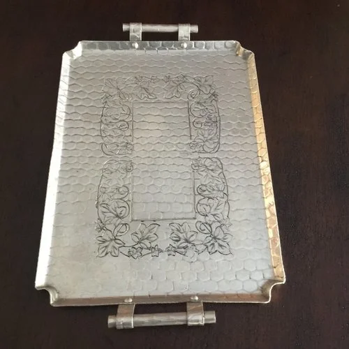 Aluminum Grape Tray. True Mid-century modern aluminum rectangle serving tray with handles. Embossed with grape leaf pattern. 15.25" x 11.25" rectangle. 17.25" with handles.