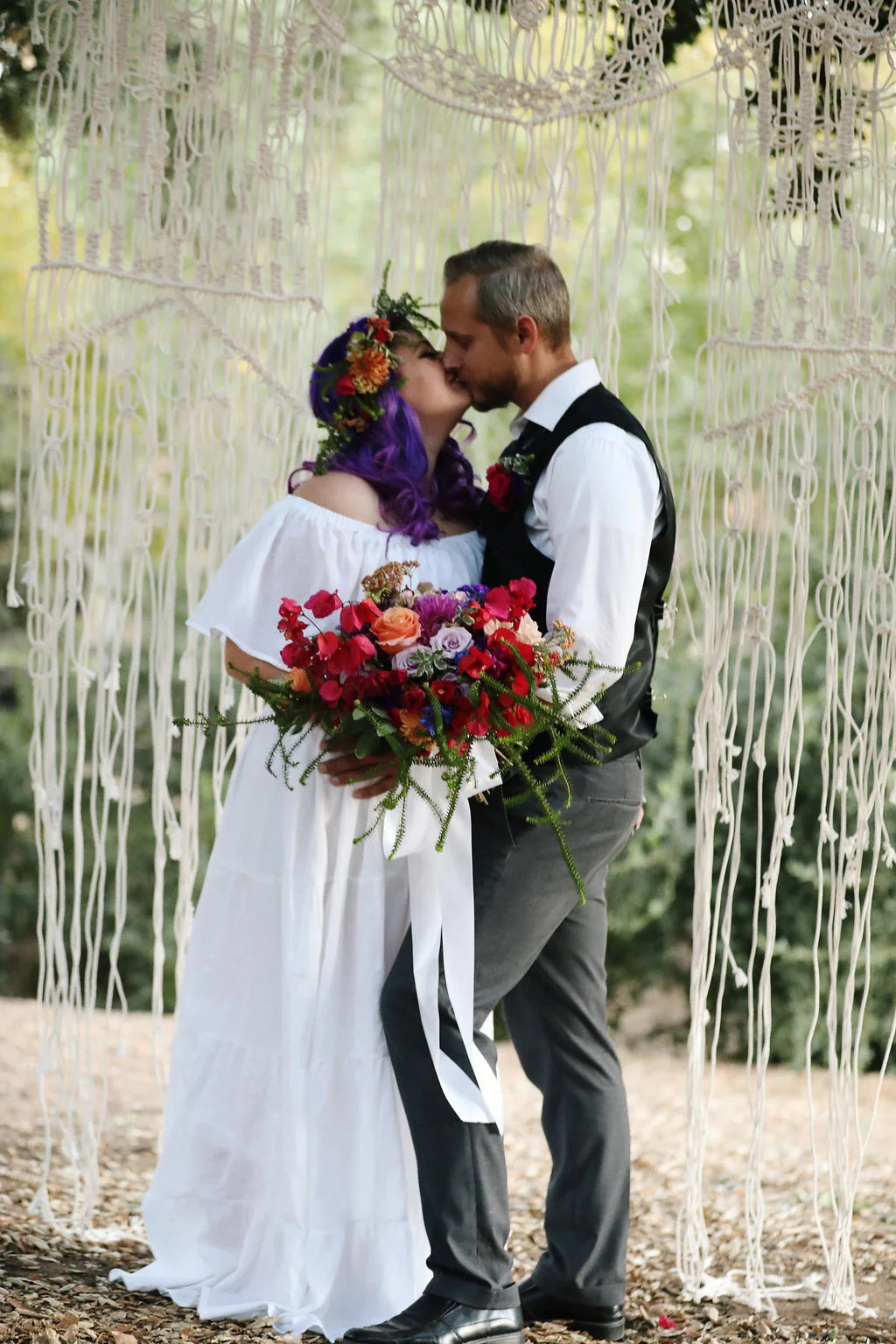 Handmade custom backdrop made for ultra violet hair bride and groom.