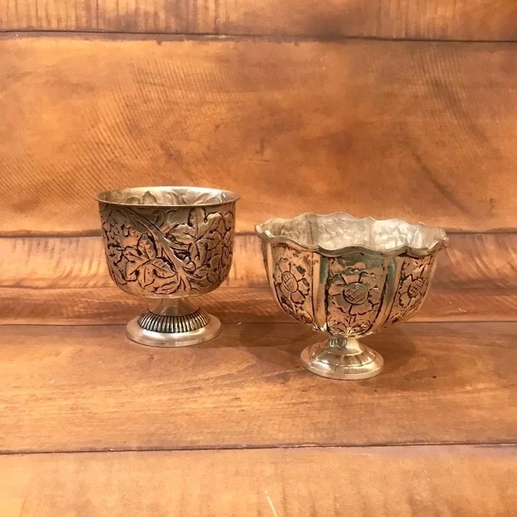 Silver vessels great for bridal bouquets.