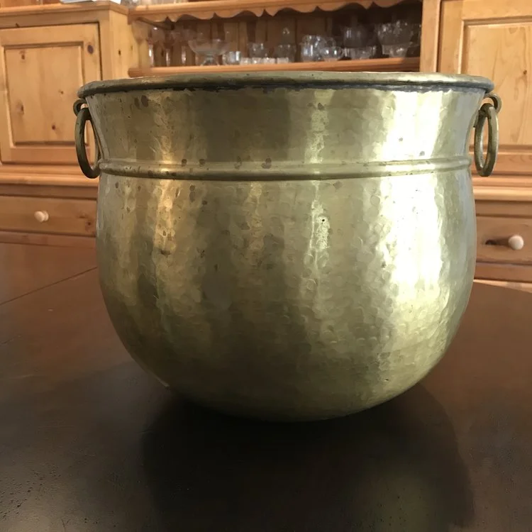 Solid Brass Container Bohemian hammered solid brass urn style vessel with two round handles and a rolled band. 15" round x 12" high