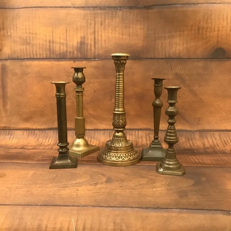Medium Brass Candlesticks 8”-13” tall. All mismatched.