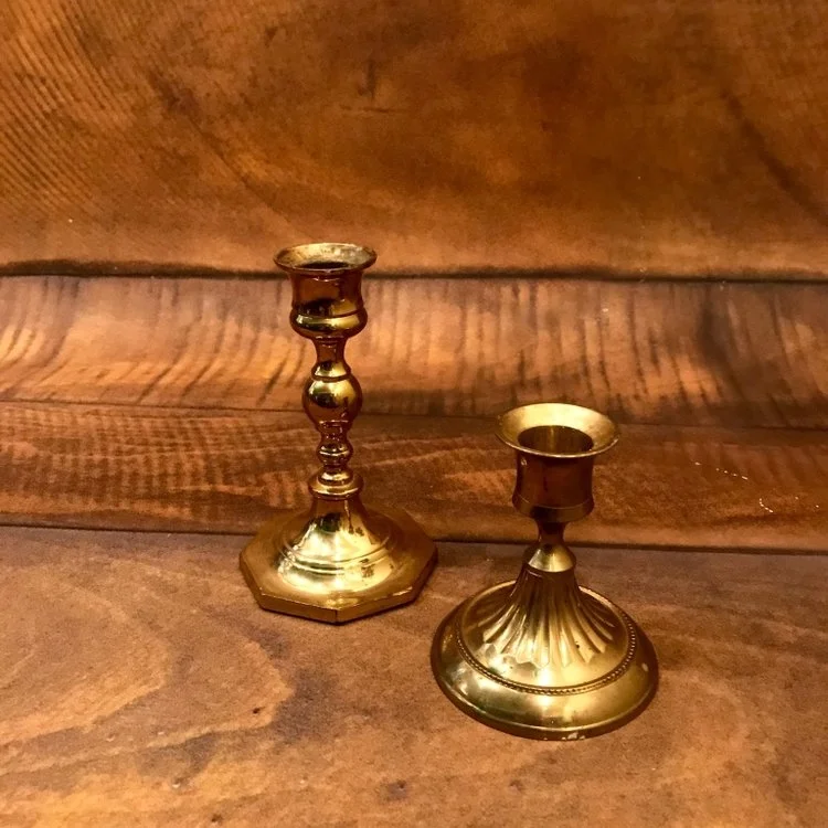 Small Brass Candlesticks 3”-7” tall. All mismatched.