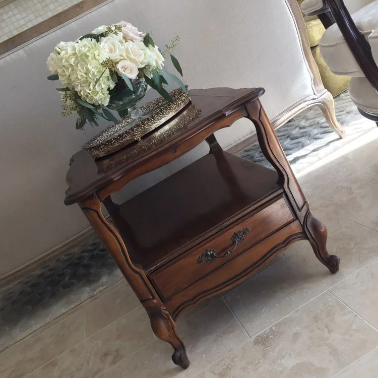 Christian Side table with one shelf and drawer. 27" x 21" rectangle. 21" high. Shelf at 12".