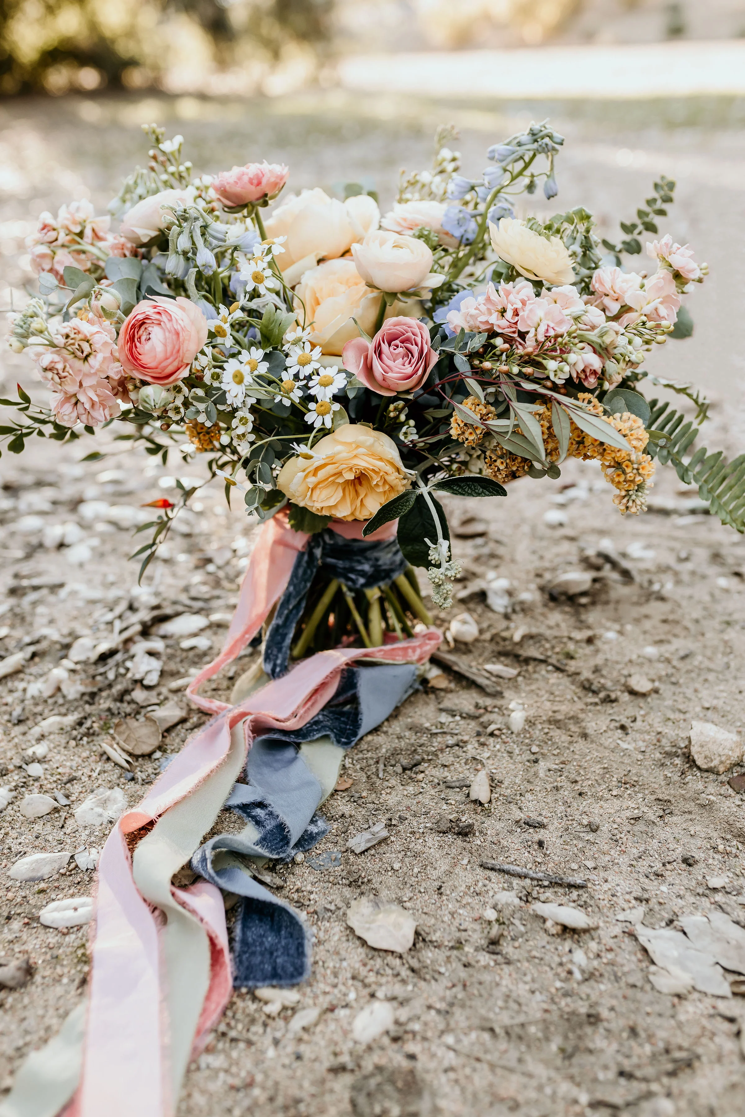 Vintage pink and pastel floral bridal bouquet used at the Alice in Wonderland styled shoot at Chateau Adare in Murrieta.