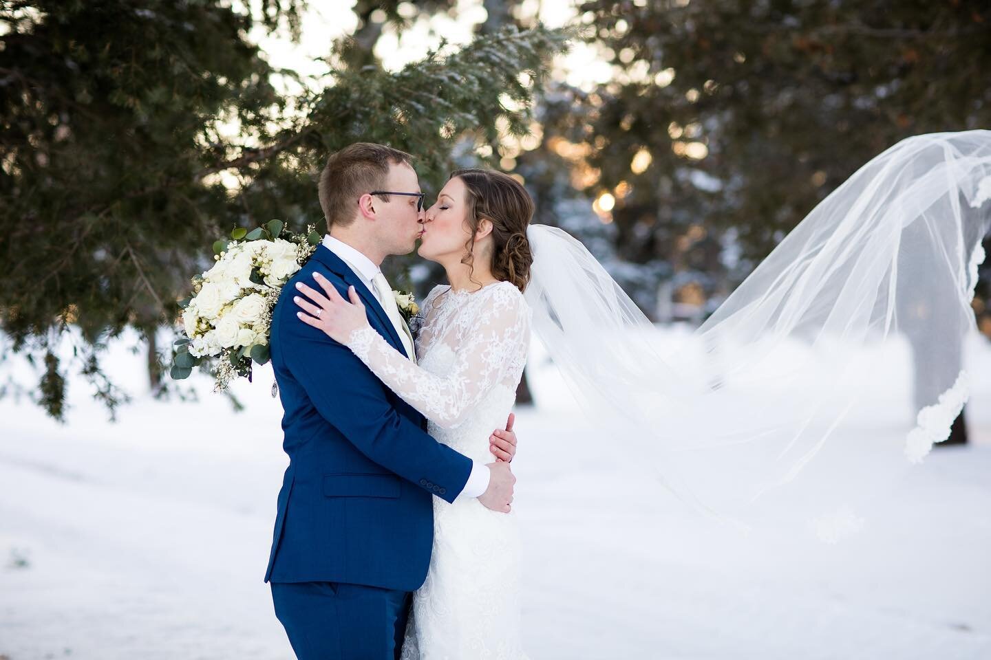 I&rsquo;ve been editing this winter wonderland of a wedding this week, and it has me missing snow! Do you think we&rsquo;ll get more snow this year? I hope so. ❄️ #winterwedding #nwdbestphoto2022 #bluesuit #omahaweddingphotographer #nebraskaweddingph
