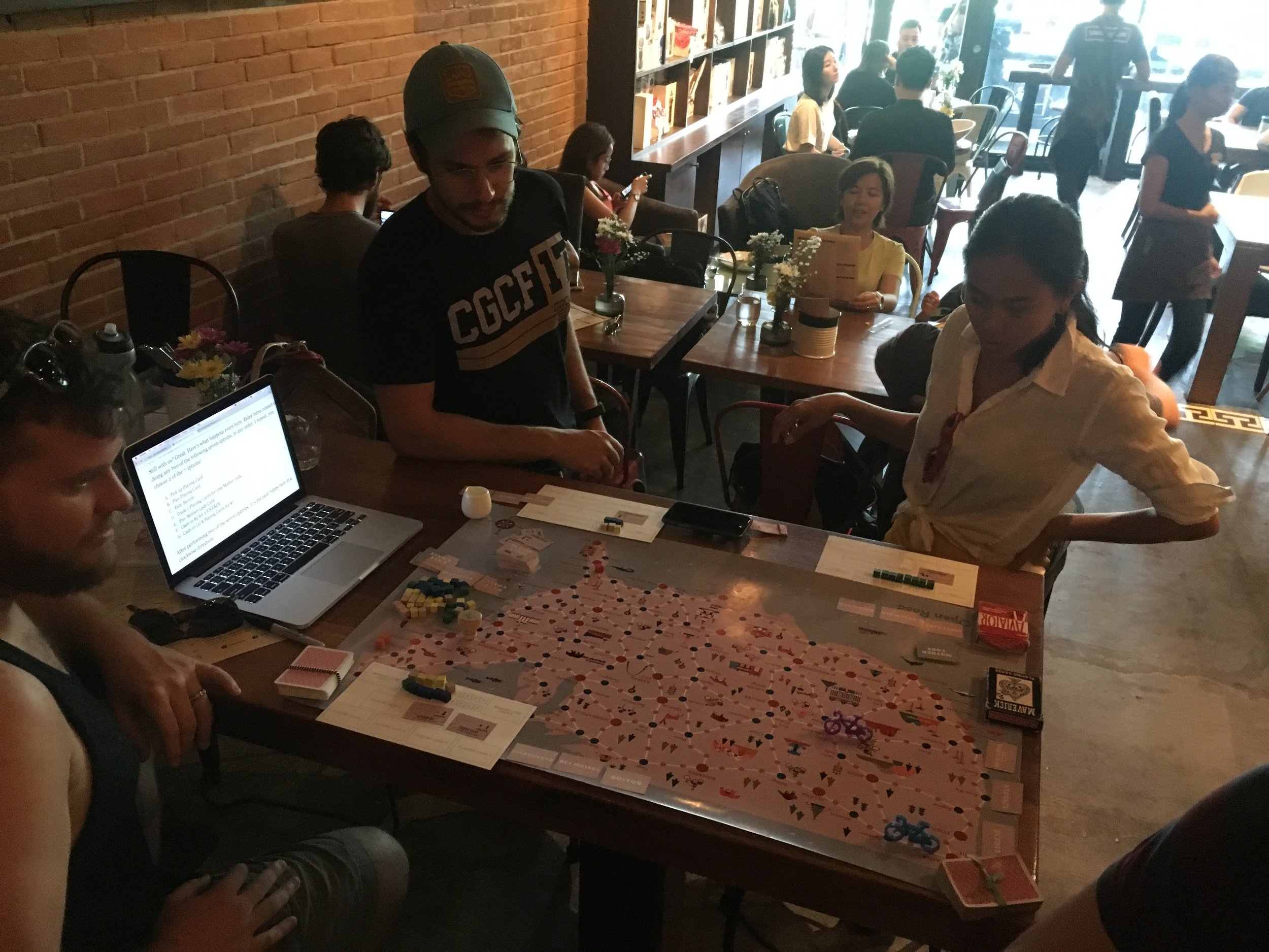 Chris and Max having a go at The Open Road . Some of our first and most important players of the game in its early stages.
