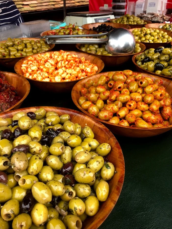YELLOW SUNSHINE Fresh Marinated Olives hand made Fresh Baklava Turkish Delight. 