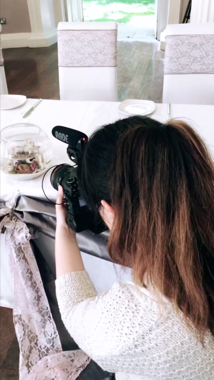Kim grabbing a shot of Goldfish at the Wedding Table 🐠