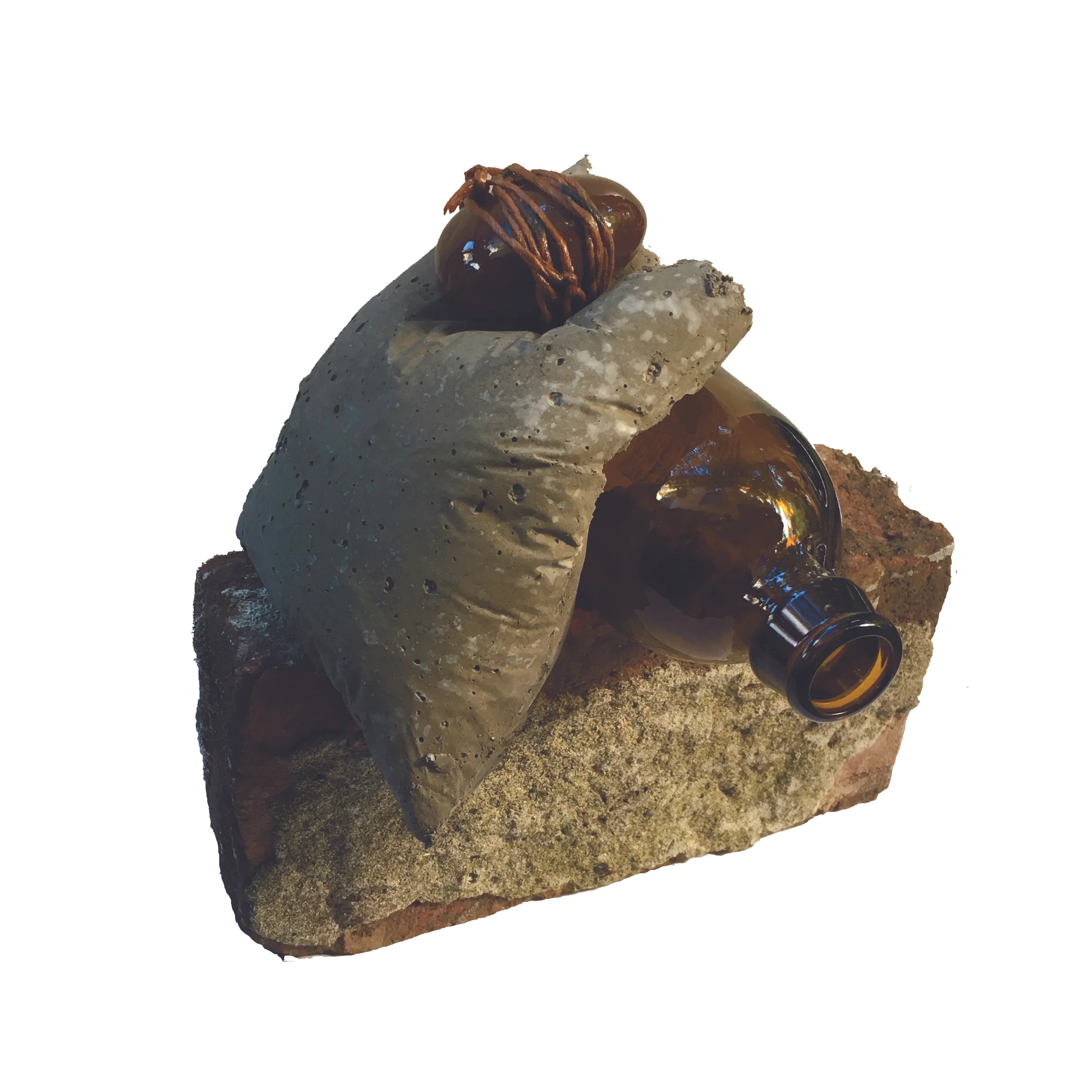 Untitled, 2019. Brick, Beer Bottle, stone, and rope.